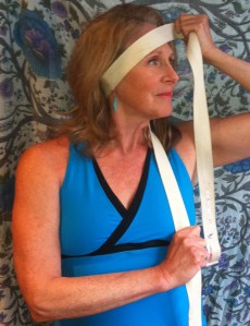 holistic health tip yoga strap neck